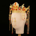 Golden ornate wedding chinese xiuhe headdress with red floral embellishments and dangling bead chains with ear clip