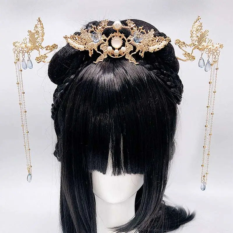 Golden phoenix hanfu female hairpin with intricate phoenix design pearl embellishments and blue teardrop stones