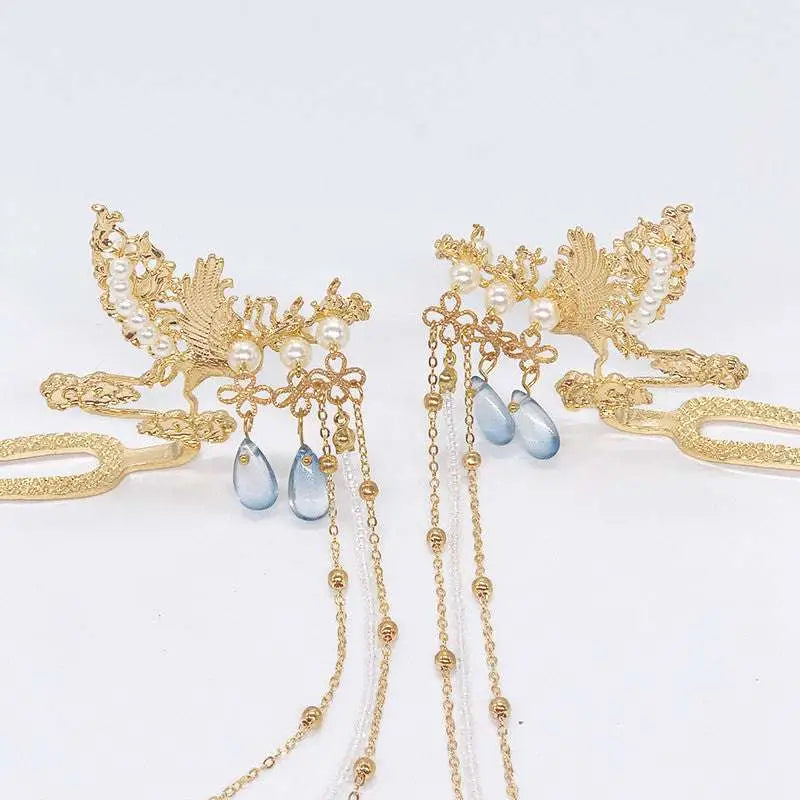 Golden phoenix hanfu female hairpin adorned with pearls and blue teardrop crystals for elegant styling