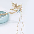 Golden phoenix hanfu female hairpin shaped like a bird with pearls and dangling blue teardrop beads