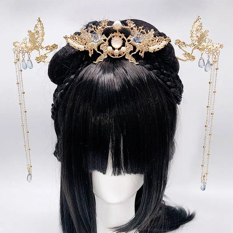 Golden phoenix hanfu female hairpin with ornate pearl embellishments and dangling blue teardrop stones