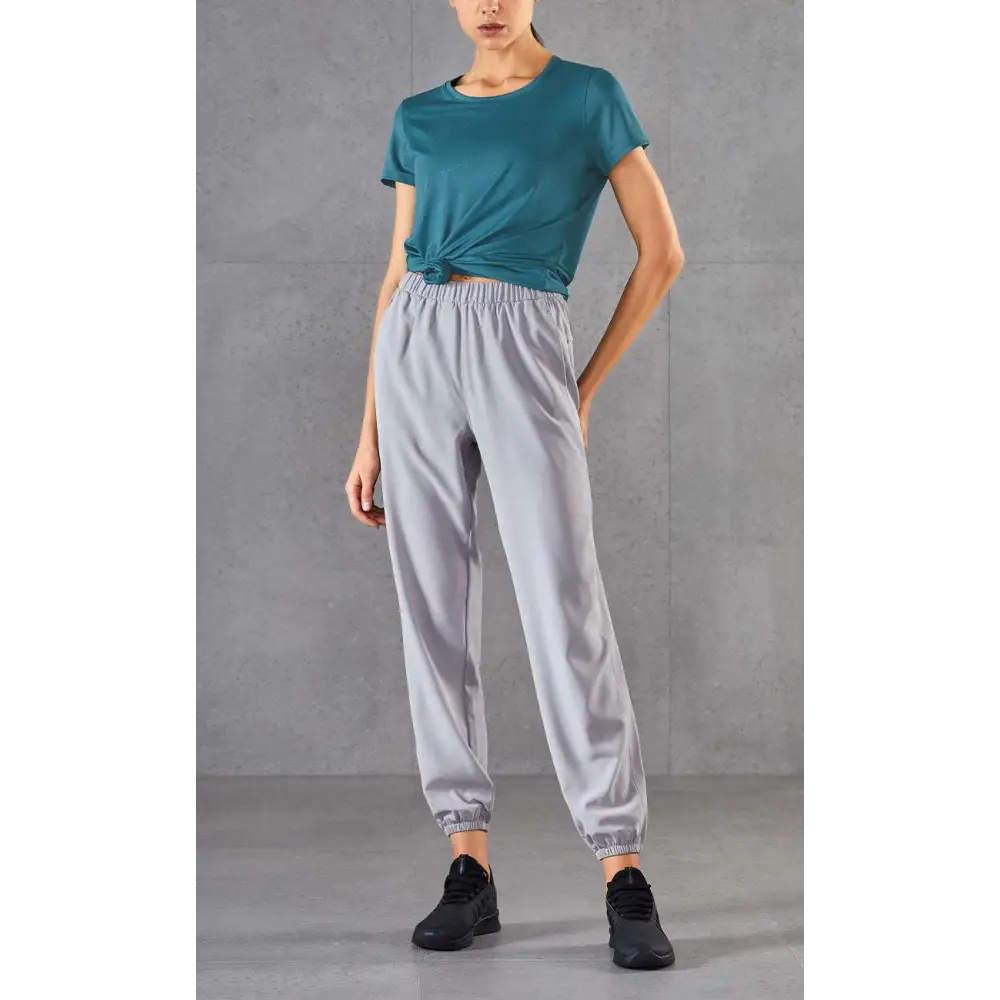 Light gray soft fabric joggers with elastic waistband and cuffs complement golden phoenix hanfu female hairpin with pearls
