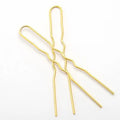 Golden wavy metal hairpins with sleek metallic finish ideal for diy hair accessories and styling use