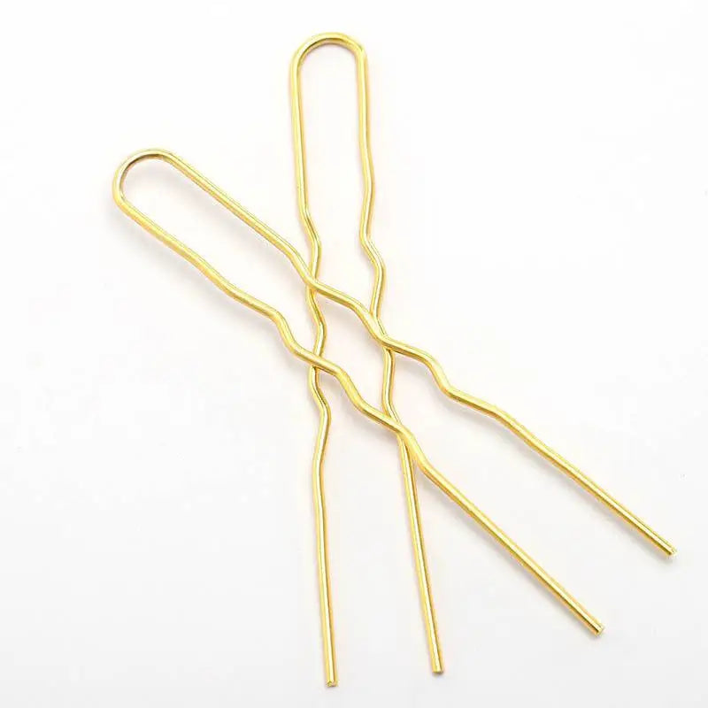 Golden wavy metal hairpins with sleek metallic finish ideal for diy hair accessories and styling use