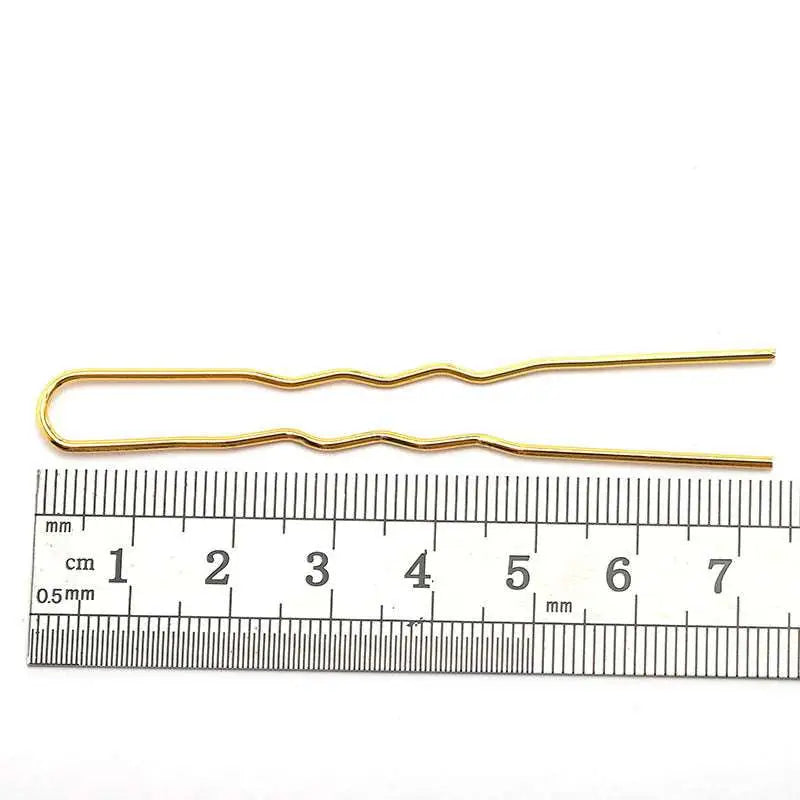 Golden wavy metal bobby pins with a sleek metallic finish designed for diy hair accessories and styling needs