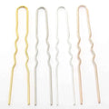 Four golden wavy metal hairpins in gold silver and rose gold with a sleek metallic finish for diy hair accessories