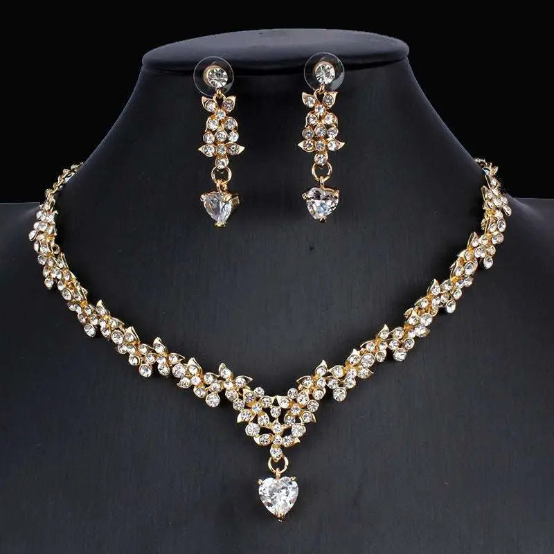 Golden zircon jewelry set featuring a gold-toned bridal floral necklace and matching zircon crystal drop earrings