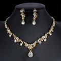 Gold-toned golden zircon jewelry set featuring a bridal floral necklace with teardrop pendant and matching zircon earrings