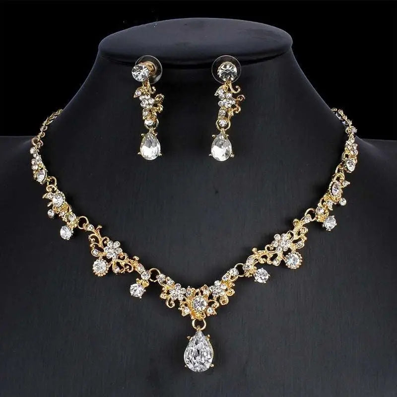 Gold-toned golden zircon jewelry set featuring a bridal floral necklace with teardrop pendant and matching zircon earrings