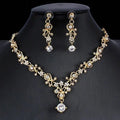 Gold-toned golden zircon jewelry set with bridal floral necklace and matching earrings adorned with clear crystals