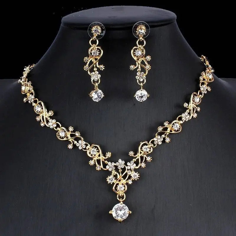 Gold-toned golden zircon jewelry set with bridal floral necklace and matching earrings adorned with clear crystals