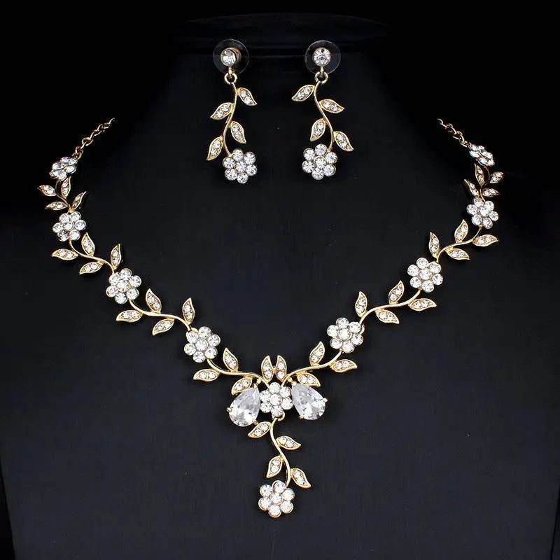 Gold-toned bridal floral necklace and earrings zircon jewelry set adorned with clear crystals for elegant occasions