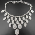 Silver rhinestone choker necklace with cascading teardrop pendants from a gorgeous diamond necklace set wedding bride accessory