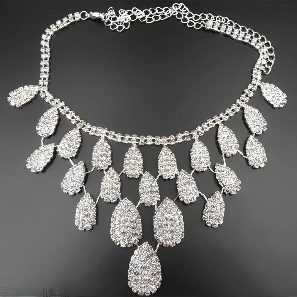 Silver rhinestone choker necklace with cascading teardrop pendants from a gorgeous diamond necklace set wedding bride accessory