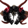 Elegant black lace gothic dark devil antelope horn headband with red and black fabric roses, skull motif, and cameo pendant