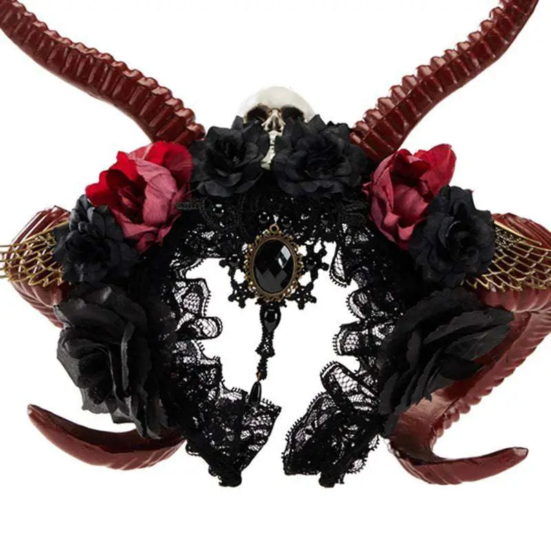 Elegant black lace gothic dark devil antelope horn headband with red and black fabric roses, skull motif, and cameo pendant