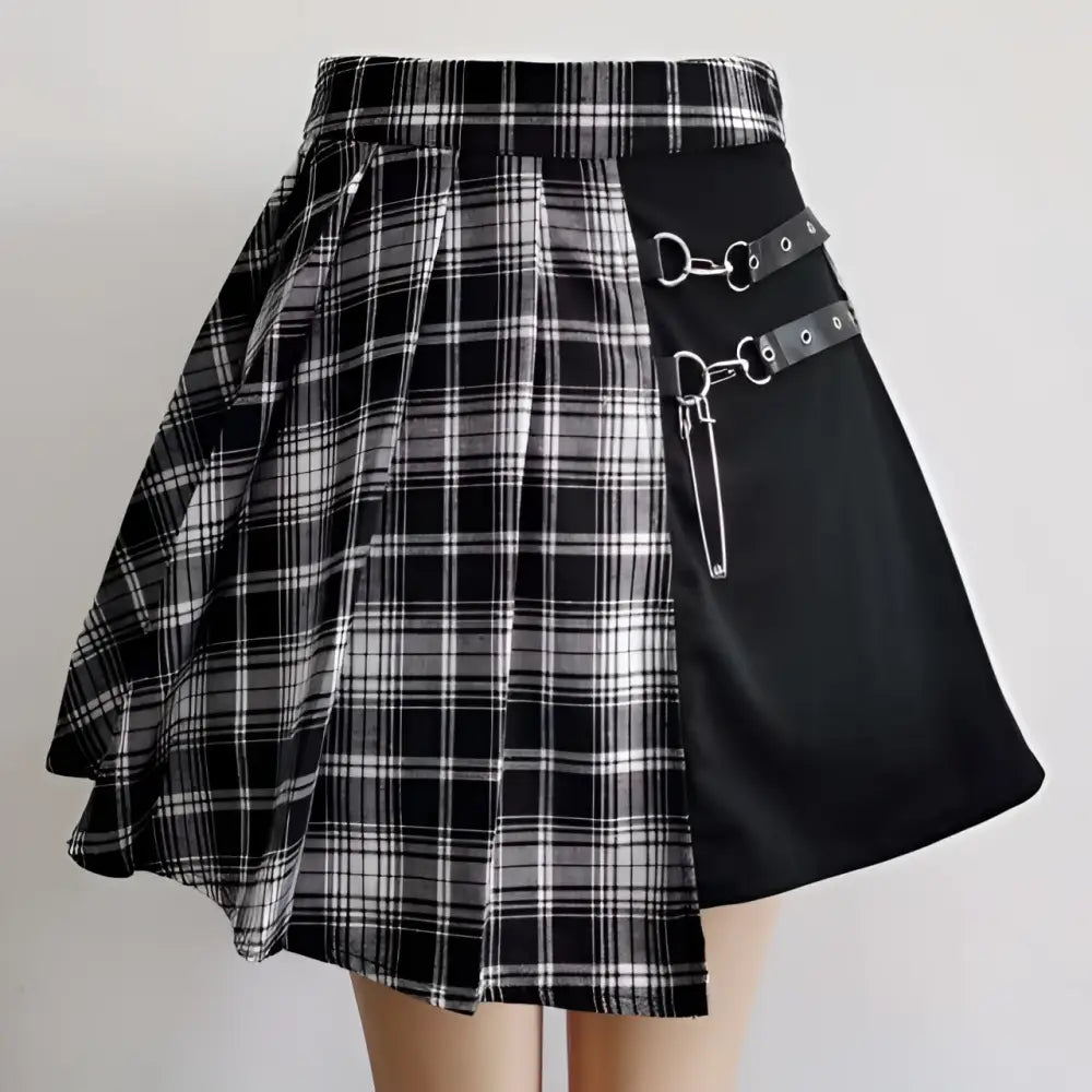 Gothic pleated short skirt in black and white plaid with black leather straps and silver metal hardware buckles