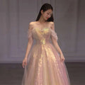 A shimmering blush pink and gold sequined off-the-shoulder mesh slimming annual party banquet mermaid dress