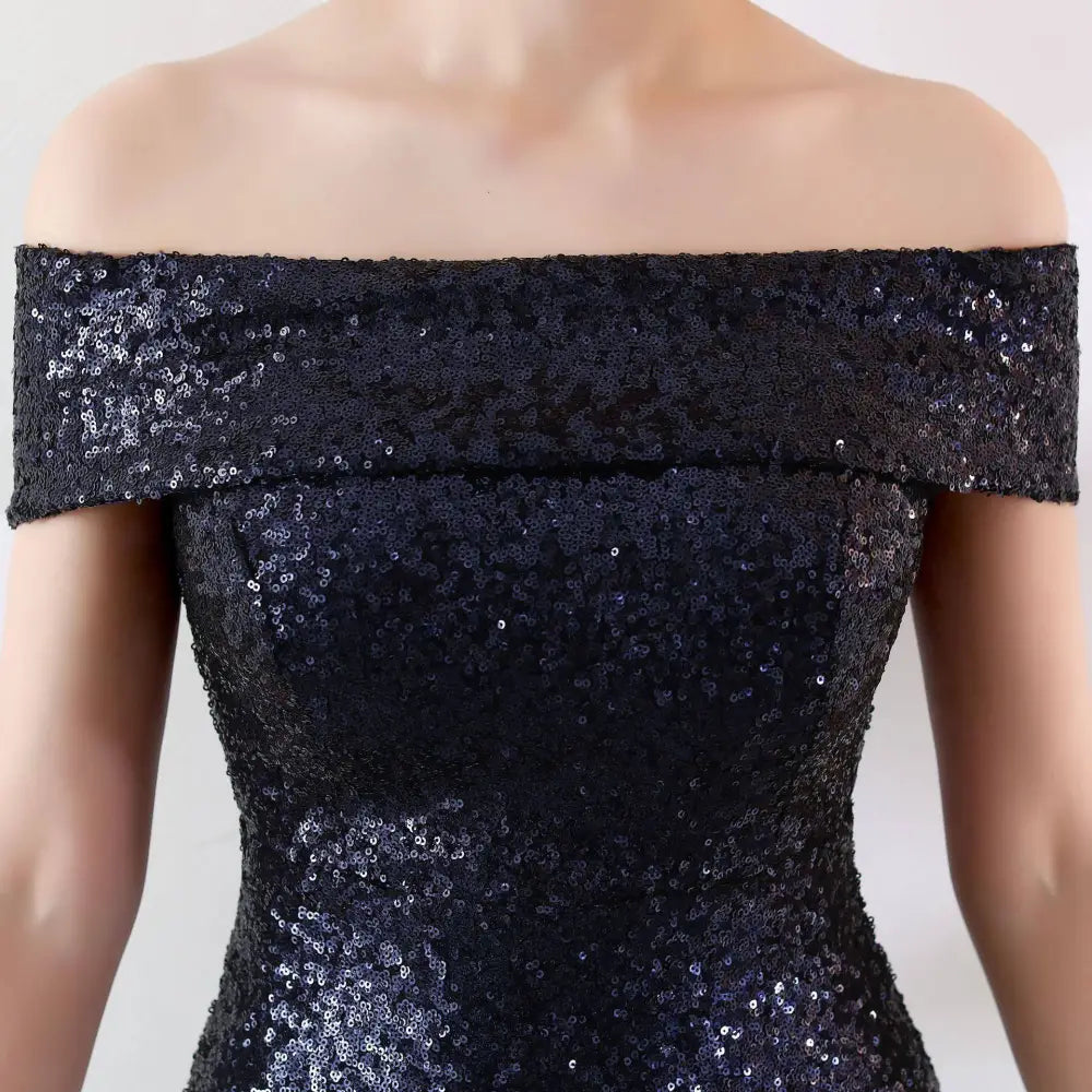 A shimmering black sequined off-the-shoulder slimming host gown perfect as a gradient sequined birthday party dress