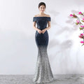 A slimming host gown with deep navy to silver gradient sequins in reflective material for a birthday party dress