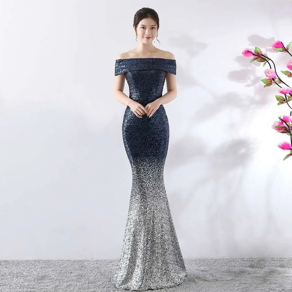 A slimming host gown with deep navy to silver gradient sequins in reflective material for a birthday party dress