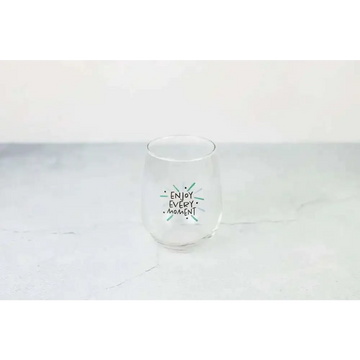 Clear stemless wine glass with enjoy every moment printed in black and green in grapefruit body scrub spa gift basket