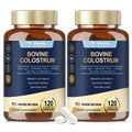 Two amber glass bottles of totaria health grass-fed bovine colostrum capsules support immune health 240 count