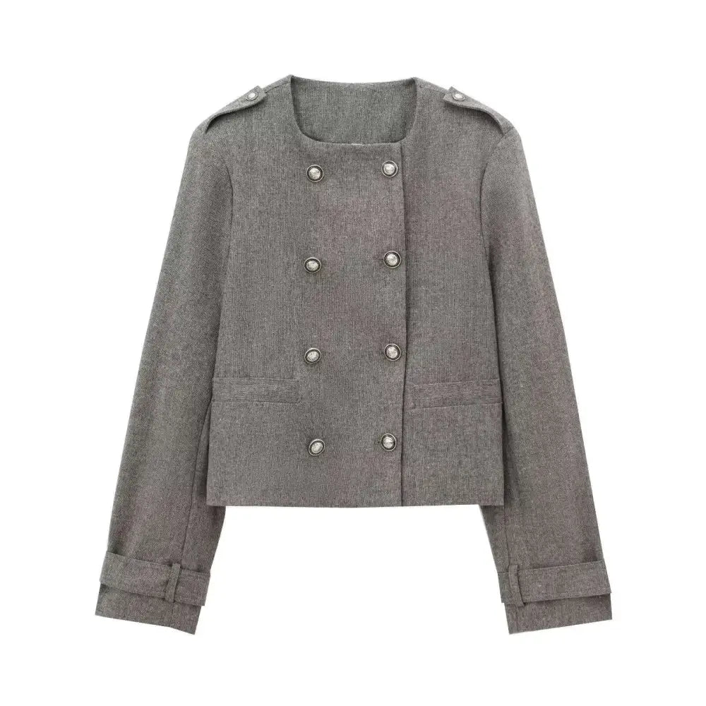 Gray double breasted coat with silver buttons and textured fabric paired with blended coat width pleated skirt