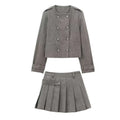 Gray double breasted coat with silver buttons and matching gray tweed pleated skirt in blended coat width design