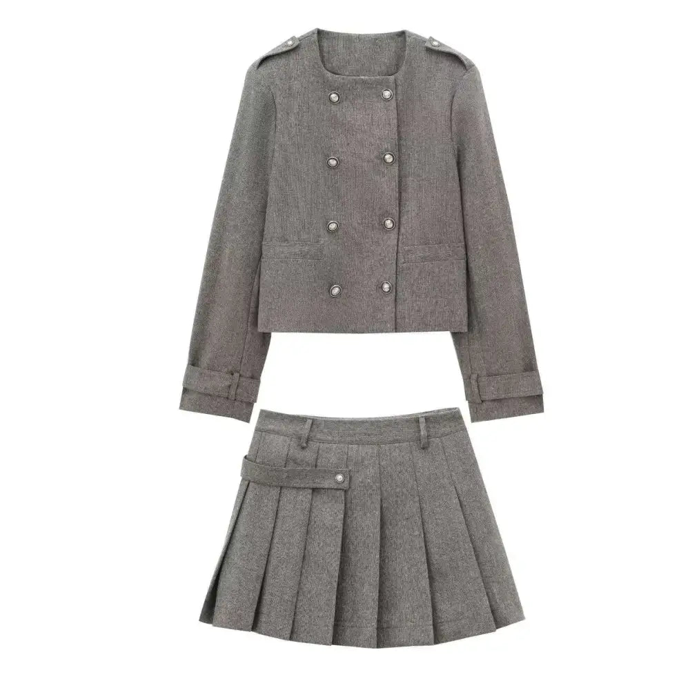 Gray double breasted coat with silver buttons and matching gray tweed pleated skirt in blended coat width design