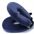 Navy blue plush foldable travel pillow with black adjustable straps and gray foldable travel pillow circular design