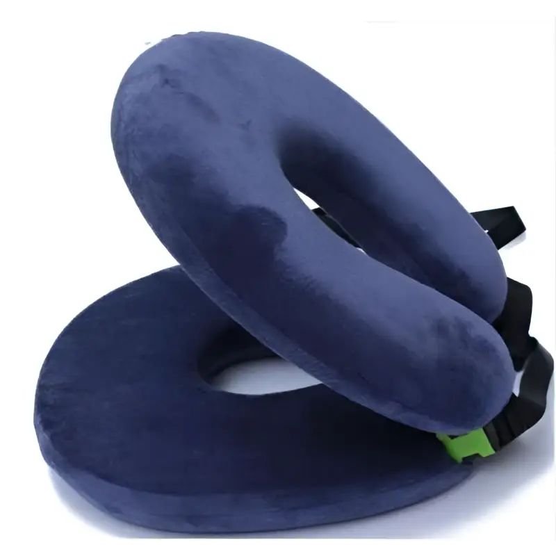 Navy blue plush foldable travel pillow with black adjustable straps and gray foldable travel pillow circular design