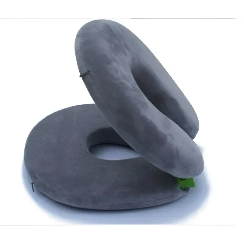 Gray foldable travel pillow with circular design and plush foldable travel inflatable cervical pillow texture