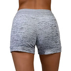 Gray heathered women shorts with stretch sports fabric and snug elastic drawstring waistband for athletic use