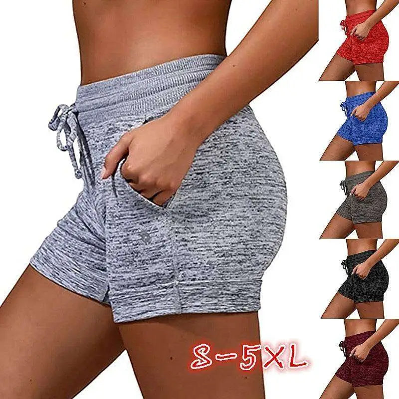 Gray heathered women shorts with drawstring waistband and side pockets made from stretch sports fabric