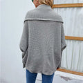 Gray loose knitted sweater with wide ribbed collar ribbed cuffs and flowing sleeves solid color cardigan