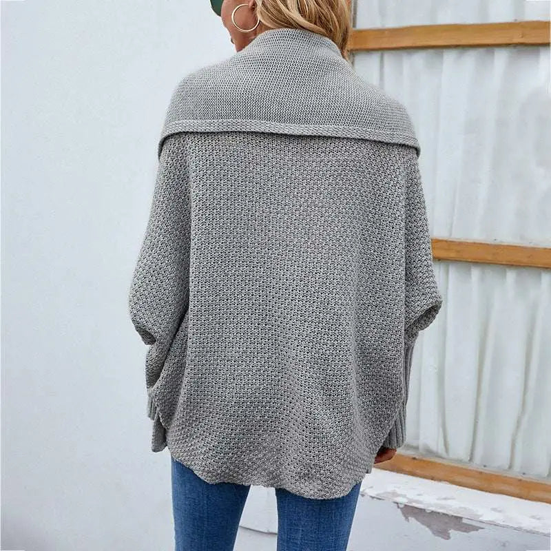 Gray loose knitted sweater with wide ribbed collar ribbed cuffs and flowing sleeves solid color cardigan