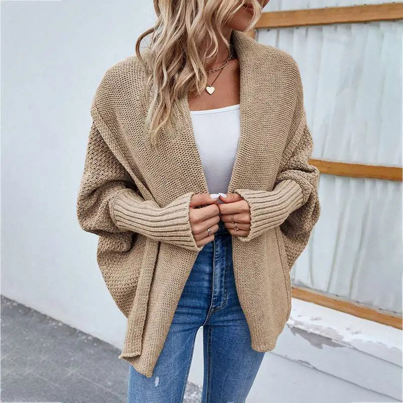Beige loose knitted sweater with ribbed cuffs and textured open-front design solid color cardigan