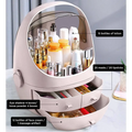 Beige two-tiered makeup organizer with waterproof dust proof transparent dome lid and pull-out drawers for storage