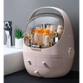 Pastel pink egg-shaped makeup organizer with waterproof dust proof transparent dome lid and two front drawers