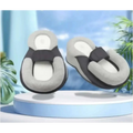 Gray and black cushioned slip-on sandals with memory foam baby anti-spit up pillow and soft plush interior