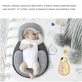 Gray memory foam baby anti-spit up pillow with 15-degree slope and pure cotton fabric for feeding comfort and safety
