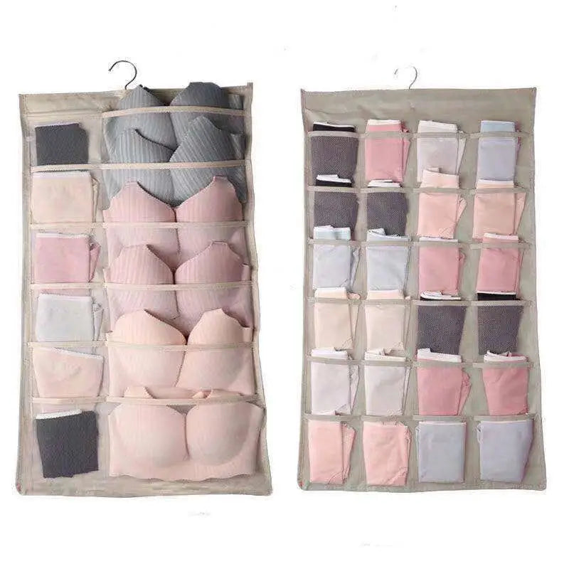 Beige fabric lingerie hanging storage bag with multiple compartments holding bras and panties in soft pastel shades