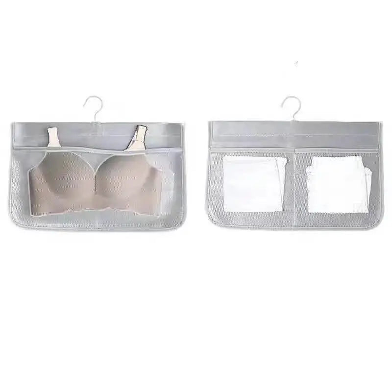 Gray mesh bra hanging storage bag with multiple compartments including a central section and two side pockets