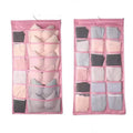 Pink fabric hanging storage bag with multiple compartments for bras and underwear in contrast to gray mesh bra bag
