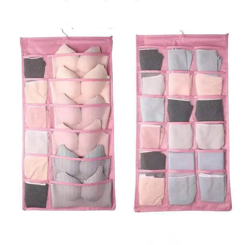 Pink fabric hanging storage bag with multiple compartments for bras and underwear in contrast to gray mesh bra bag