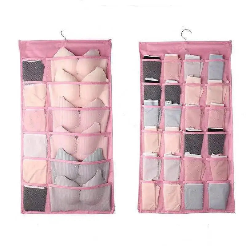 Pink fabric hanging storage bag with multiple compartments for organizing bras and underwear in gray mesh bra style
