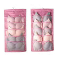 Pink fabric bra organizer with multiple compartments holding colorful bras inside a gray mesh bra hanging storage bag