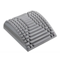 Gray neck and back stretcher cushion with textured raised pyramid and rectangular bumps to alleviate discomfort and relieve tension