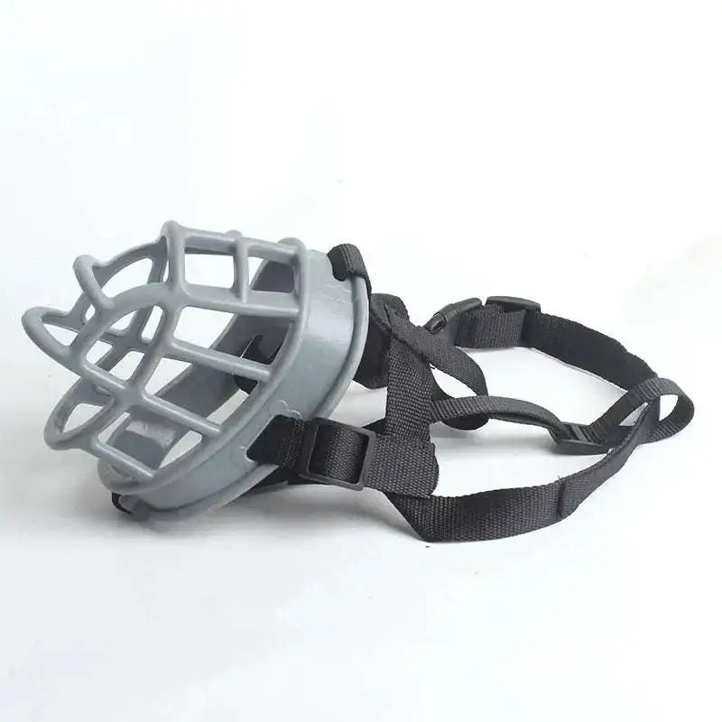 Gray silicone dog muzzle made of silicone with black adjustable straps for secure fit during vet visits